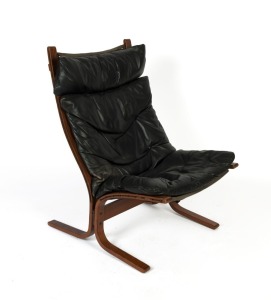 A vintage black leather lounge chair, circa 1960s, 97cm high, 63cm wide