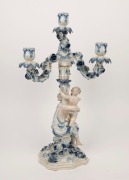 An antique German blue and white porcelain candelabra with figural base, 19th century,&nbsp; blue factory mark to base, ​​​​​​​47cm high - 4