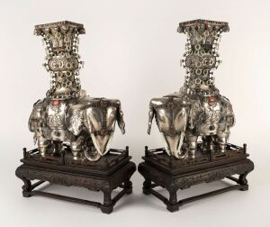 A pair of impressive Chinese silver elephant vases adorned with carved jade rings and semi-precious stones, 19th/20th century, an impressive 42cm high