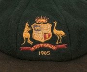 PETER IAN PHILPOTT (1934 - 2021) AUSTRALIAN TEST PLAYER Number 234 Philpott's Baggy Green Cap (with Farmer's label bearing typed player's name) with embroidered Australian coat-of-arms and the date "1965" attractively presented in a glazed timber case and - 3