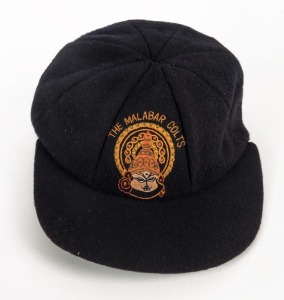 INDIA: THE MALABAR COLTS CRICKET CLUB peaked pure wool cap with club logo embroidered to front panel; made by Nadkarni & Co., Bombay, with their label affixed to the crown.