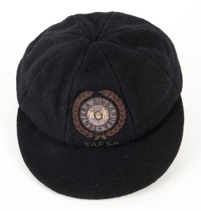 SINGAPORE ARMED FORCES CRICKET ASSOCIATION: Match worn team cap in pure wool with SAFSA logo embroidered to front panel, circa 1970s.