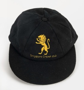 SINGAPORE CRICKET CLUB: Peaked woollen cap with lion logo embroidered to front panel and "Fosters of London" makers label to internal crown, circa 1980s.
