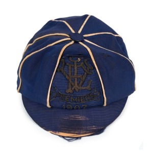 1907 VICTORIAN FOOTBALL LEAGUE PREMIERSHIP CAP: blue with white piping and wire embroidered "VFL, Premiers, 1907" to front panel. awarded to Carlton's Archie Snell (92 games 1902-07).