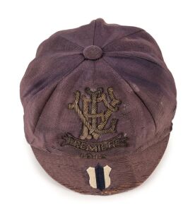 CARLTON PREMIERSHIP: 1915 VFL Premiership Honour cap, faded blue (original colour at back) with wire embroidered 'VFL PREMIERS, 1915' on front panel, and blue & white shield embroidered in Carlton colours on brim; maker's label (Lincoln, Stuart & Co. Ltd.