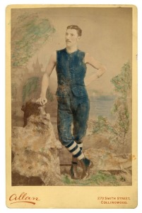 GEORGE COULTHARD (Carlton, 1876 - 1882) hand-coloured cabinet card size albumen print by Mark Joseph Allan, 270 Smith Street, Collingwood. Coulthard is shown in his Carlton uniform and football boots in a studio setting. Overall 16 x 10.5cm. The only know