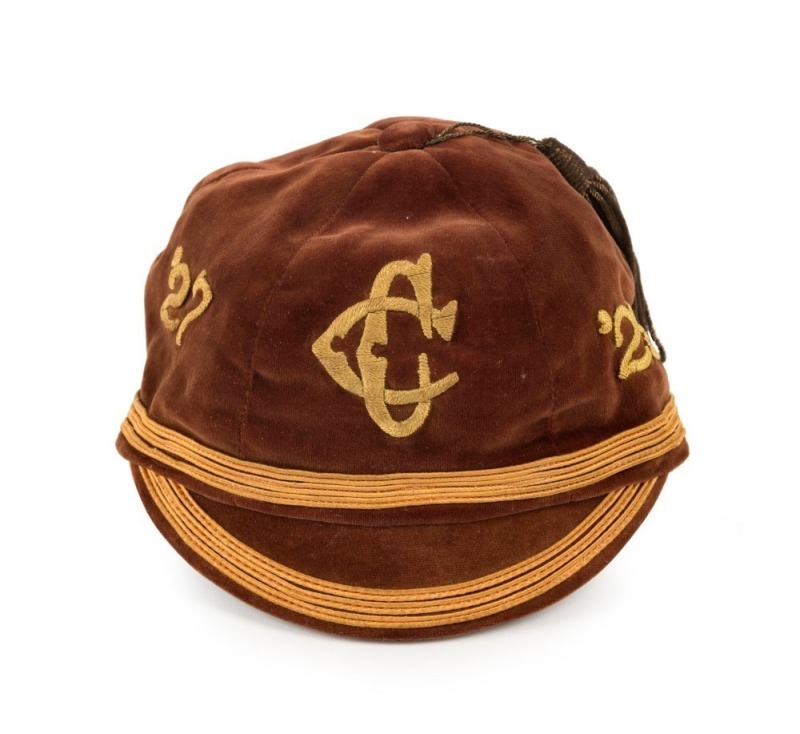 NEW ZEALAND: An honour cap in brown velvet with gold piping, a metallic thread tassel and embroidered "'27 CC '28" to the front three panels; maker's label for J. Ballantyne & Co. Ltd, New Zealand, with the name "Mr. J. Galbraith" added in pen. Very fine