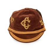 NEW ZEALAND: An honour cap in brown velvet with gold piping, a metallic thread tassel and embroidered "'27 CC '28" to the front three panels; maker's label for J. Ballantyne & Co. Ltd, New Zealand, with the name "Mr. J. Galbraith" added in pen. Very fine