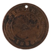 1886 Football Medal, showing on front a footballer running with ball in hand and "Stokes and Martin, Melbourne"; verso with "Victoria 1886" with leaves between the word and the date with a blank centre; hold at top. Believed to be associated with an inter - 2