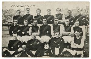 ESSENDON F.C. postcard by photographer J E Barnes (Kew) published by Lincoln, Stuart and Co General Outfitters; superb frontal appearance
