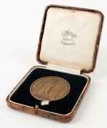 1934 BRITISH EMPIRE GAMES, LONDON, bronze participation medal in the maker's presentation box (F. Phillips, Aldershot); the medal 44mm diameter. - 3