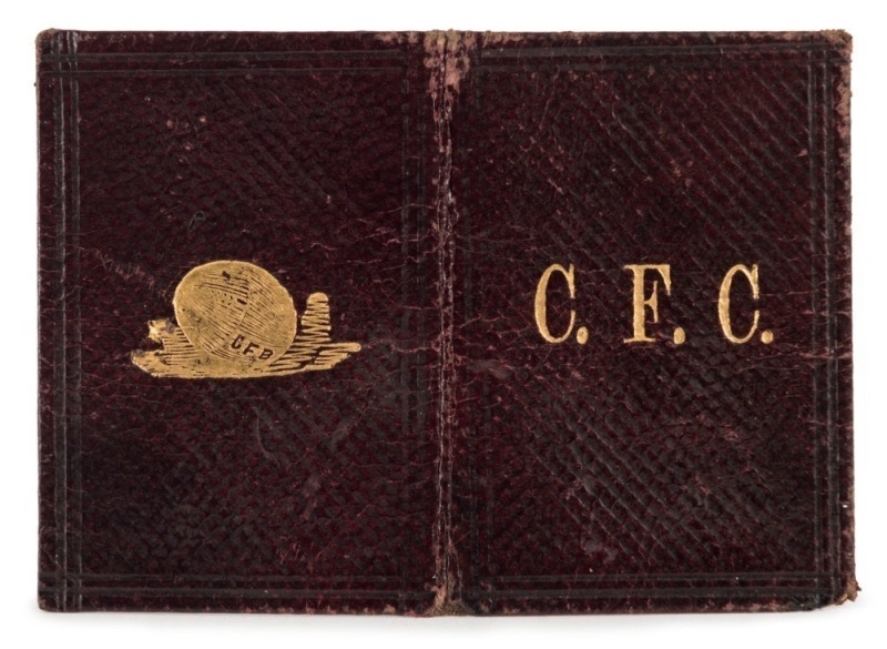 1879 Carlton membership season ticket, covered in gilt tooled dark brown leather, overall 5.5 x 7.6cm when opened out.