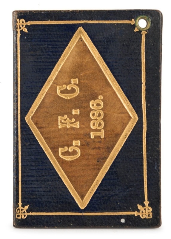 1886 Carlton membership season ticket, covered in gilt tooled dark blue and pale brown leather binding; the interior surfaces with printed details of the club leadership and the fixtures for the club's first and second teams, overall 7.5 x 10.3cm when ope