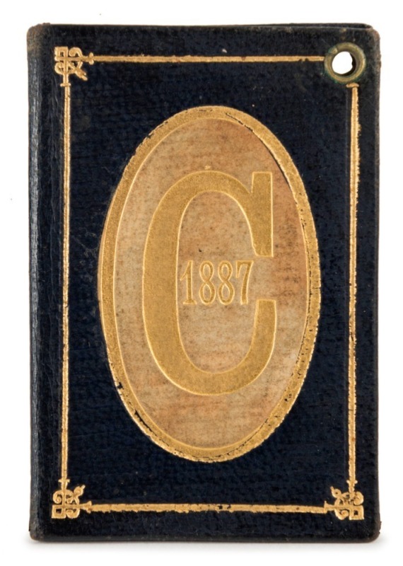 1887 Carlton membership season ticket, covered in gilt tooled dark blue and pale brown leather binding; the interior surfaces with printed details of the club leadership and the fixtures for the club's first and second teams, overall 7.5 x 10.3cm when ope