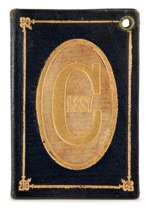 1887 Carlton membership season ticket, covered in gilt tooled dark blue and pale brown leather binding; the interior surfaces with printed details of the club leadership and the fixtures for the club's first and second teams, overall 7.5 x 10.3cm when ope