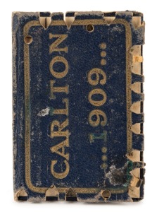 1909 Carlton membership season ticket (#802), covered in gilt tooled navy leather binding; the interior surfaces with printed details of the club leadership and the fixtures for the club's first team; a hole punched for each game attended, overall 8.2 x 1