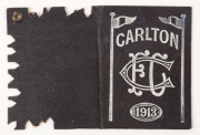 1913 Carlton membership season ticket (#917), covered in black buckram with white text and decorations; the interior surfaces with printed details of the club leadership and the fixtures for the team; a hole punched for each game attended, overall 8.2 x 1 - 3