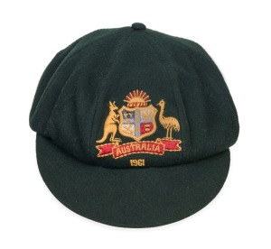 BOB SIMPSON'S 1961 BAGGY GREEN CAP, Bob Simpson's "Baggy Green" Australian Test Team cap, green wool with embroidered Australian coat of arms and the series date "1961" embroidered to the front panel. Farmer's Sydney makers label to inside crown with "R. SIMPSON" typed on the label. Simpson received this cap on his selection for the series against West Indies in 1961. The series was played in Australia with Australia winning the five test series 2/1. Simpson made two centuries as well as six sco