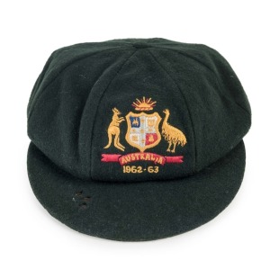 BARRY JARMAN'S 1962-63 BAGGY GREEN, Barry Jarman's "Baggy Green" Australian Test Team cap awarded to him on his selection for the Ashes Series against England in Australia 1962-1963; green wool with Australian coat of arms and the dates "1962 - 1963"embroidered to the front panel. Farmer's Sydney makers label sewn to inside surface with "B. Jarman" typed onto the label. Jarman represented Australian in 19 test matches between December 1959 and January 1969.