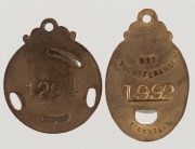MELBOURNE CRICKET CLUB, membership fobs for 1930-31 (#1204) and 1933-34 (#1992), both made by C. Bentley. (2). - 2