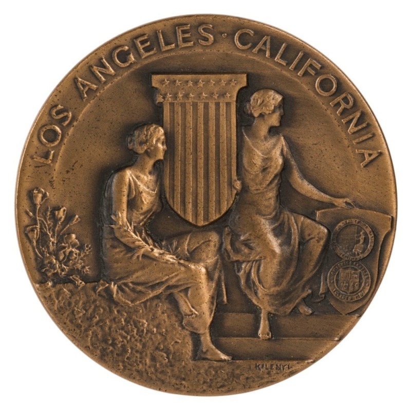 1932 LOS ANGELES bronze Participation Medal by Julio Kilenyi of New York, and produced by Whitehead-Hoag, USA; 69mm, 147gm. Obverse: standing male athlete carrying an unfurled banner of the Xth Olympiad. Reverse: Two seated female figures supporting the s