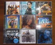 MUSIC: Signed CDs (42) & DVDs (8), noted Sonic Youth (2), Cyndi Lauper, George Martin (The Beatles record producer - 4), The Vines, Rihanna, Sarah McLachlan (6), Ricky Martin (2). Also 2 promo cassettes of Colin Hay (unsigned).