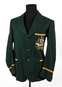 1950 BRITISH EMPIRE GAMES AUCKLAND: Australian team blazer belonging to R. Jackson, manager of the Australian boxing team to the games; Green flannel, gold silk trim, original buttons and labels; The Coat of Arms to the pocket in superb condition however, some evidence of moth damage in places (minor).