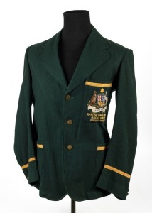 1950 BRITISH EMPIRE GAMES AUCKLAND: Australian team blazer belonging to R. Jackson, manager of the Australian boxing team to the games; Green flannel, gold silk trim, original buttons and labels; The Coat of Arms to the pocket in superb condition however,