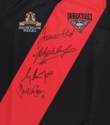 ESSENDON: Celebrating The History of the Brownlow Medal souvenir club jersey signed by winners Graham Moss, Gavin Wanganeen, James Hird and Jobe Watson. - 2