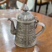 A Bhutanese silver teapot with finely chased decoration, 19th century, ​​​​​​​17cm high, 410 grams - 4