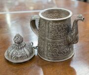 A Bhutanese silver teapot with finely chased decoration, 19th century, ​​​​​​​17cm high, 410 grams - 5