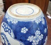 A antique Chinese blue and white porcelain ginger jar with carved timber base, 19th century,  24cm high overall - 6