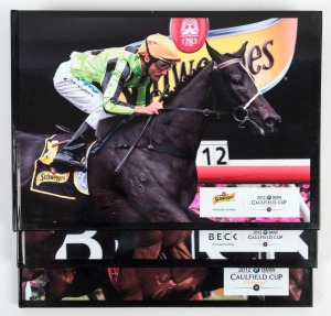 Limited edition hard-bound photographic records prepared by BMW: "2012 Schweppes Thousand Guineas Day", "2012 Beck Caulfield Guineas Day" and "2012 The Age Caulfield Cup Day". (3 items)