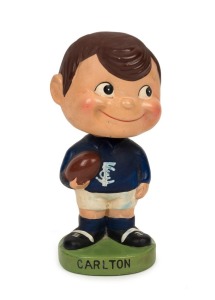 CARLTON: c.1960 bobblehead figurine, made in Japan by Grizelle, in Carlton colours with logo to jumper and club name at base, 15cm tall.