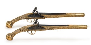 A superb pair of antique flintlock pistols (Kubur), ornately decorated in gilded silver repousse work, original bluing near mint condition, Ottoman Balkans origin, circa 1830s, 51cm long