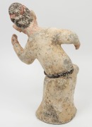 A Chinese pottery statue of a male figure with ball, remains of polychrome finish, Tang Dynasty 618 to 907 A.D. Accompanied by a thermoluminescence test certificate from the Oxford Authenticity, United Kingdom, (HK 2123-687). 38cm high - 5