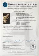 A Chinese pottery statue of a male figure with ball, remains of polychrome finish, Tang Dynasty 618 to 907 A.D. Accompanied by a thermoluminescence test certificate from the Oxford Authenticity, United Kingdom, (HK 2123-687). 38cm high - 8