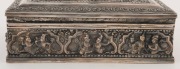 A Burmese silver box with timber lining, 20th century, stamped "95% SILVER, BURMESE" with additional maker's marks, ​​​​​​​8cm high, 19cm wide, 12cm deep, 852 grams total including timber lining - 6