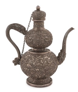 An antique Chinese silver double gourd shaped teapot with dragon decoration, 19th century, 20.5cm high, 576 grams