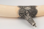 An antique Indian silver mounted ivory ornament resting on two carved ebony elephants, 19th century, an impressive 51cm high, 74cm long - 3