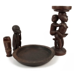 A tribal stool, bowl, statue and vessel, carved wood with remains of lime pigment, Papua New Guinea, the stool 42cm high