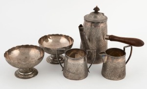 An antique Chinese silver tea set with engraved decoration, comprising a teapot, milk jug and sugar basin, together with a pair of sweetmeat dishes, 19th/20th century, (5 items), the teapot 15cm high, 860 grams total including wooden handle and finial