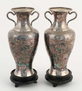 A pair of Chinese silver vases with engraved decoration, 19th/20th century, mounted on later wooden bases, 18cm high overall, 372 grams silver weight