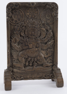 137 · Shadbhuja Mahakala Tibetan carved stone table screen, reverse adorned with verse, 19th/20th century, ​24cm high
