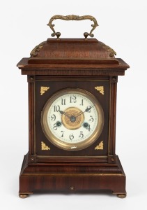 An antique German mantel clock in walnut case with gilt metal and brass trim, 14 day time and strike movement, late 19th century, original paper label inside the door "H.A.C. 14 Day Strike, Made In Württemberg", 38cm high overall