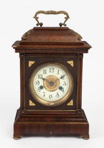 An antique German mantel clock in walnut case with gilt metal and brass trim, 14 day time and strike movement, late 19th century, original paper label inside the door "H.A.C. 14 Day Strike, Made In Württemberg", ​​​​​​​38cm high overall