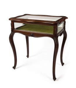 An antique English mahogany bijouterie table with green velvet interior and carved cabriole legs, executed in the French style, late 19th century, 84cm high, 78cm wide, 51cm deep