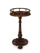 A fine quality antique English mahogany kettle stand with gallery top and beautifully carved column and base with melon feet, circa 1840, 67cm high, 35cm diameter