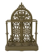 FALKIRK cast iron umbrella stand in green painted finish, stamped "Falkirk" with diamond registration mark, 104cm high, 76cm wide, 24cm deep