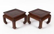 A pair of Chinese rosewood square form stands, 20th century, ​​​​​​​25cm high, 34cm wide, 34cm deep